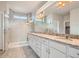 Double vanity bathroom with granite countertop and large shower at 2549 Lupton Ln, Lafayette, CO 80026