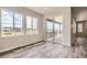 View of backyard from sunlit dining area with access to deck at 2549 Lupton Ln, Lafayette, CO 80026