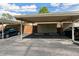 Covered carport parking spaces for residents at 9079 E Nassau Ave, Denver, CO 80237