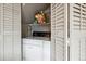 Convenient laundry closet with washer and dryer hookups at 9079 E Nassau Ave, Denver, CO 80237