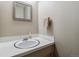 Clean bathroom with a single sink vanity and shower/tub at 9079 E Nassau Ave, Denver, CO 80237