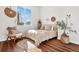 Cozy bedroom with neutral decor and large window at 4307 Opal Ct, Castle Rock, CO 80104