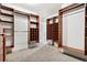 Large walk-in closet with custom built-in shelving at 4307 Opal Ct, Castle Rock, CO 80104