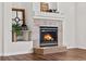 Elegant fireplace with stone surround at 4307 Opal Ct, Castle Rock, CO 80104