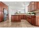 Spacious kitchen with wood cabinets, granite countertops, and stainless steel appliances at 4307 Opal Ct, Castle Rock, CO 80104