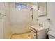 Small basement bathroom with shower stall at 4020 Newman St, Wheat Ridge, CO 80033