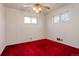 Bright bedroom with red carpet and ceiling fan at 4020 Newman St, Wheat Ridge, CO 80033