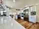 Open concept kitchen boasting stainless steel appliances and an island at 601 W Layton Ave, Englewood, CO 80110