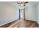 Well-lit bedroom featuring wood flooring and window at 6420 S Dayton St # J06, Englewood, CO 80111