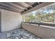 Spacious balcony with treetop views and a rug at 6420 S Dayton St # J06, Englewood, CO 80111