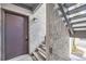 Private entry with exterior stairs and door at 6420 S Dayton St # J06, Englewood, CO 80111
