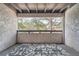 Private balcony overlooking a tree-filled landscape at 6420 S Dayton St # J06, Englewood, CO 80111