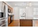 Modern kitchen with stainless steel appliances and granite countertops at 9674 Truckee St, Commerce City, CO 80022