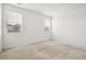 Bright bedroom featuring neutral walls and carpeting at 9674 Truckee St, Commerce City, CO 80022