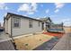 Backyard with a trampoline and space for play at 9674 Truckee St, Commerce City, CO 80022
