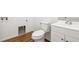 Clean bathroom with white vanity and vinyl flooring at 9674 Truckee St, Commerce City, CO 80022