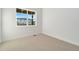 Bright bedroom with a window and carpet flooring at 23835 E River Front Dr, Aurora, CO 80019