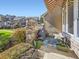 Small patio with seating, grill, and colorful rug at 6220 Salvia St, Arvada, CO 80403