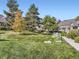 Landscaped community with walking paths and green space at 6220 Salvia St, Arvada, CO 80403