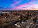 Aerial view showcasing the home's neighborhood and mountain views at 3565 S Holly St, Denver, CO 80237