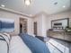 Inviting Primary bedroom with plush carpeting, a comfortable bed, and stylish decor at 5186 N Quemoy Ct, Aurora, CO 80019