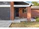 Front entry of a brick ranch house at 3564 S Jasper Way, Aurora, CO 80013