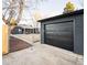 Attached garage with dark gray exterior at 1698 S Garfield St, Denver, CO 80210