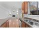 Kitchen with island, stainless steel appliances, and view of Gathering room at 11735 Helena St, Commerce City, CO 80022