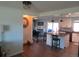 Open concept dining area adjacent to kitchen and living room at 2262 Ammons St, Lakewood, CO 80214