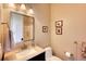 Small bathroom with vanity, toilet and shower at 5236 Bear Mountain Dr, Evergreen, CO 80439