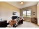 Bright home office with window view and built-in shelving at 5236 Bear Mountain Dr, Evergreen, CO 80439