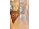 Bathroom with vanity, toilet and view of garden at 5236 Bear Mountain Dr, Evergreen, CO 80439