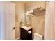 Clean bathroom with a toilet, sink, and shower at 5236 Bear Mountain Dr, Evergreen, CO 80439