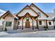 Stunning Craftsman home with stone and wood accents at 5236 Bear Mountain Dr, Evergreen, CO 80439