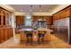 Spacious kitchen with a large island, custom cabinetry, and a walk-in pantry at 5236 Bear Mountain Dr, Evergreen, CO 80439