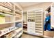 Spacious walk-in closet with shelving and drawers at 5236 Bear Mountain Dr, Evergreen, CO 80439