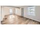 Dining room with hardwood floors, chandelier, and view of street at 2360 S Franklin St, Denver, CO 80210