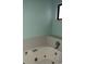 Bathroom with jetted bathtub and tiled surround at 2213 S Kingston Ct, Aurora, CO 80014