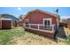 Home exterior showcasing a deck and fenced-in backyard at 148 N Irvington St, Aurora, CO 80018