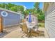 Private backyard with patio furniture and storage shed at 2349 W Fair Ave, Littleton, CO 80120