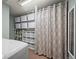 Laundry room with shelving, storage and washer/dryer at 1111 Elysian Field Dr # D, Lafayette, CO 80026