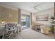 Dining area with round table, chairs, and access to a patio at 1111 Elysian Field Dr # D, Lafayette, CO 80026