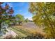 View of a backyard and open space beyond at 1111 Elysian Field Dr # D, Lafayette, CO 80026