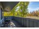 Deck with table and chairs overlooking a tranquil landscape at 1111 Elysian Field Dr # D, Lafayette, CO 80026