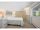 Bright bedroom with large window and double closet at 1111 Elysian Field Dr # D, Lafayette, CO 80026