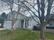 Two-story home with gray siding and landscaping at 2758 S Cathay Ct, Aurora, CO 80013