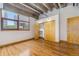 Spacious bedroom with hardwood floors and a large closet at 1020 15Th St # 202, Denver, CO 80202