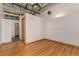Bright bedroom with hardwood floors and an ensuite bathroom at 1020 15Th St # 202, Denver, CO 80202