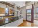 Modern kitchen with granite countertops and stainless steel appliances at 1020 15Th St # 202, Denver, CO 80202