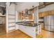Modern kitchen with granite countertops and stainless steel appliances at 1020 15Th St # 202, Denver, CO 80202